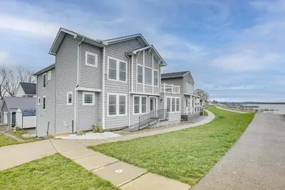 a large house on the side of a road at Waterfront Buckeye Lake House Deck and Views! in Hebron