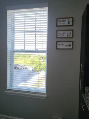 a window in a room with a view of a street at Luxury 1BR/1BA w/ Top Amenities in Prime Location in Fort Wayne