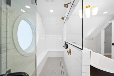a bathroom with a sink and a shower at Clawfoot Tub, Next to Monastery Wedding Venue, 3BR in Cincinnati