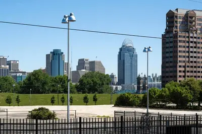 a view of a city skyline with tall buildings at 2BR Townhome with Parking - Walk to Stadiums & Downtown in Covington
