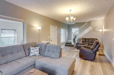 a living room with a couch and a chair at Peaceful Shiloh Home with Deck and Fishing Pond Access in Shiloh