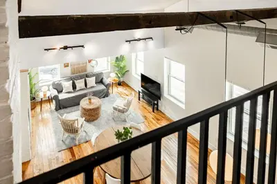 an overhead view of a living room with a couch at Soaring 2BR Parkside Loft Walkable to it All in Cincinnati