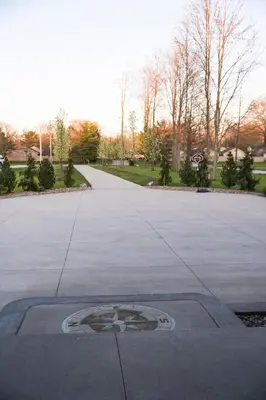 aphalt street with a man hole in the middle at FeralWoods Private Estate With Hot Tub in Columbia Station