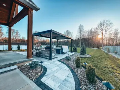 a pavilion with a picnic table in a yard at FeralWoods Private Estate With Hot Tub in Columbia Station