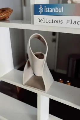 a white high heel shoe sitting on a shelf at Maple Heights Serenity Libby Unit 2 in Maple Heights