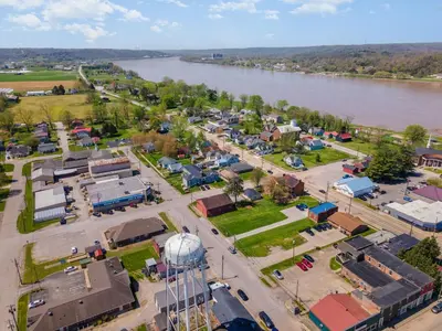 an aerial view of a town next to a river at The Carriage House in Warsaw