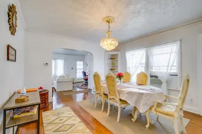 a dining room with a table and chairs at Trendy South Euclid Apt - 5 Mi to Cleveland Clinic in South Euclid