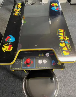 a close up of a video game controller on a table at Home in Anderson Township in Cincinnati