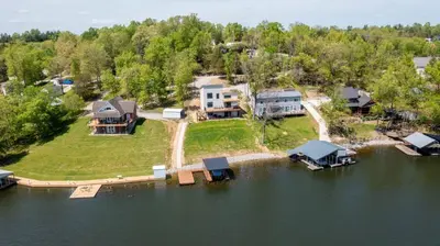 an aerial view of a house in the water at Lakeside, Water-view, 7 miles to Ark, 4BR for 14 in Williamstown