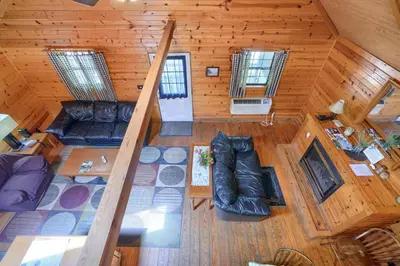 an overhead view of a living room in a cabin at Blue Rose Cabins - Pinecrest Cabin in Logan