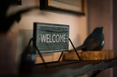 a computer screen with the words welcome on it at Hickory House Cabin in Ashley