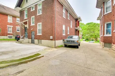 a car parked in front of a brick building at Pet-Friendly Cincinnati Apt 5 Mi to Downtown! in Cincinnati