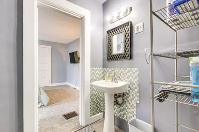 a bathroom with a sink and a mirror at Pet-Friendly Cincinnati Apt 5 Mi to Downtown! in Cincinnati
