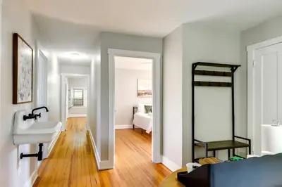 a bathroom with a sink and a mirror at Cincinnati Apartment 1 Mi to Hyde Park Square! in Cincinnati