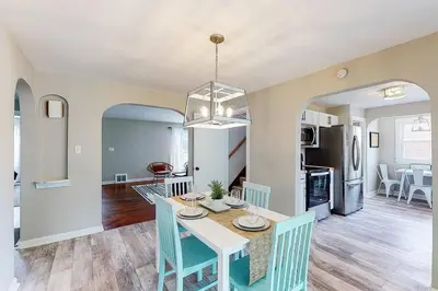 a dining room and kitchen with a table and chairs at Football Hall of Fame Hideaway-Cozy and Convenient in Canton