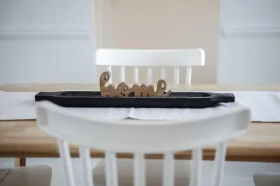 a wooden crown sitting on top of a white chair at The Perfect Pass-HOF Village Escape in Canton