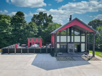 a red and white building with a pavilion at Some Kind of Wonderful-Escape Near Seneca Lake in Senecaville