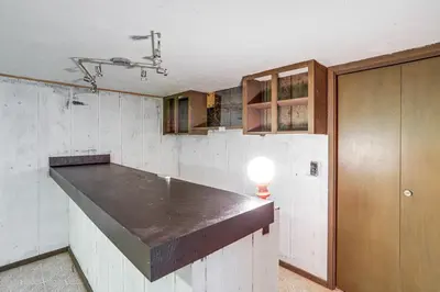 a kitchen with a counter top in a room at Lake Erie Family Getaway in Amherst Pets Welcome! in Amherst