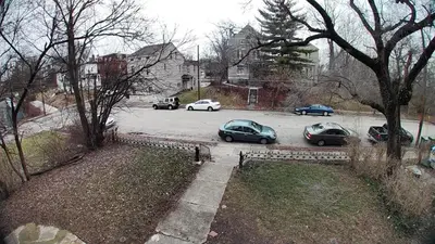 a group of cars parked in a parking lot at Second floor deluxe studio in Cincinnati