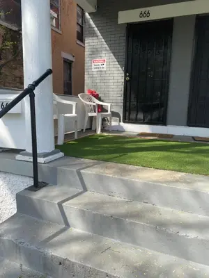 a set of stairs in front of a house at Second floor petite studio private room in Cincinnati