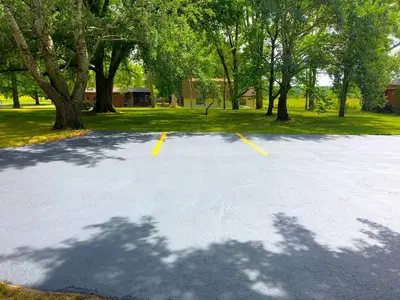an empty parking lot with trees in a park at The Vine Bed & Breakfast, LLC in Dundee