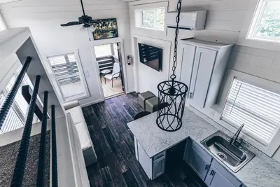 an aerial view of a kitchen in a tiny house at Cincinnati Camp Cedar in Mason