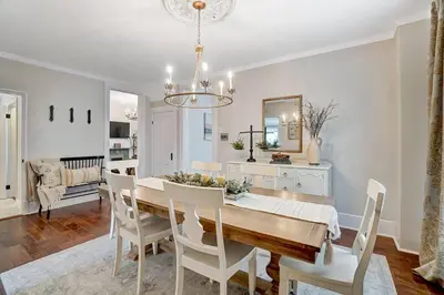 a dining room with a table and chairs at General Mitchel Historic Home in Downtown Lebanon in Lebanon