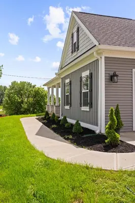 a house with a walkway in front of it at Home for 21 Near Ark - Ensuite Bathrooms - with Pool! in Williamstown
