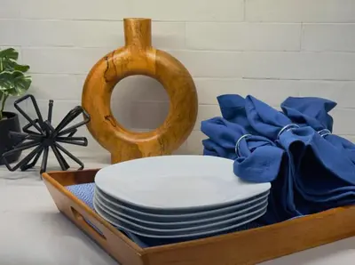 a tray filled with plates and a pile of dishes at Mt Adams Adventure in Cincinnati