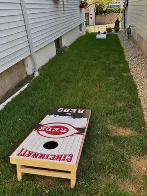 a skateboard sitting on the grass next to a house at Mt Adams Adventure in Cincinnati