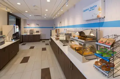 a store with a bakery with aasteryasteryasteryasteryasteryasteryasteryasteryastery at Holiday Inn Express & Suites Monroe by IHG in Monroe