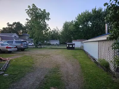 a driveway in a yard next to a building at Lima Downtown 1 Bdrm Oasis in Lima
