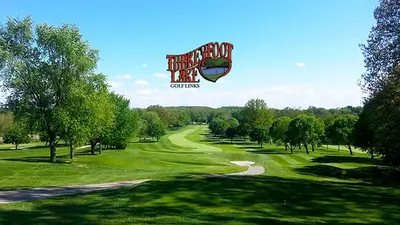 a sign that is hanging over a golf course at Portage Lakes Serenity in Akron