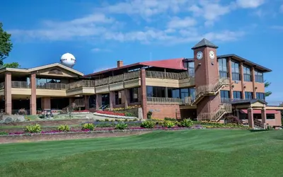 a building with a clock tower on top of it at Portage Lakes Serenity in Akron