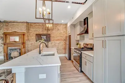 a kitchen with a sink and a counter top at Vaughn Lofts # 4 in Cincinnati