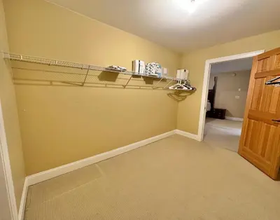 a empty room with a shelf on the wall at Redbud Retreat in Centerville