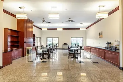 a large dining room with tables and chairs at Motel 6 Walton, KY - Richwood - Cincinnati Airport South in Walton