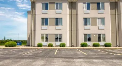a parking lot in front of a building at Hotel Markle IN I-69 in Markle