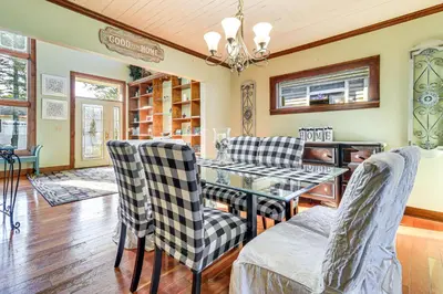 a dining room with a table and chairs at Great Lake Erie Getaway with Hot Tub and Private Beach in Avalon Beach