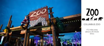 a sign in front of a building with a zoo at 4 Bed 3 bath Boutique Home Near OSU, Crew Stadium, Short North, COSI, & Downtown in Columbus