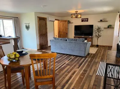 a living room with a couch and a table at Piedmont in Chester