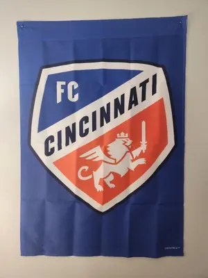 a ferrari sign on a blue curtain at FC Suites in Cincinnati