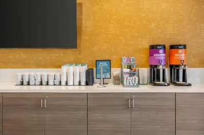 a counter with a coffee machine on top of it at Home2 Suites By Hilton Reynoldsburg Columbus East in Columbus