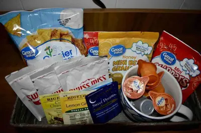 a basket filled with different types of food at Cozy Garden House in Adrian