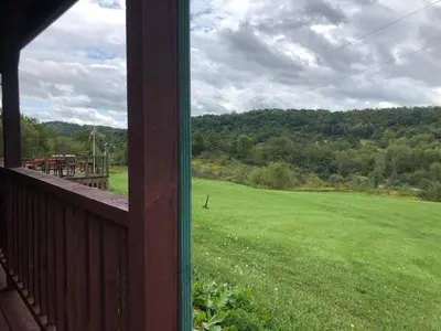 a view of a large field from a house window at Lodge 65AC Zanesville Muskingum AEP WIFI CELL SVC in Blue Rock