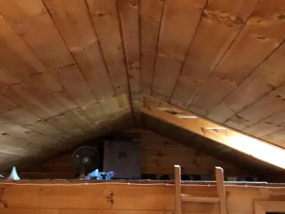 an attic with a wooden ceiling in a room at Lodge 65AC Zanesville Muskingum AEP WIFI CELL SVC in Blue Rock