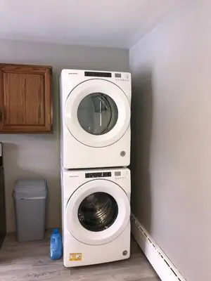a washing machine and a dryer in a room at 3BR 1BA North End Walk to the Hospital in Zanesville