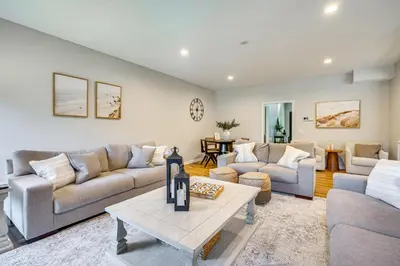 a living room with two couches and a table at Spacious Thornville Home about 8 Mi to Buckeye Lake! in Thornville