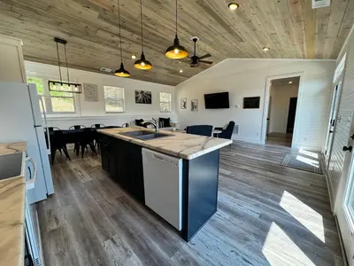 a kitchen with a sink and a counter top at 100 Acre Relaxing Retreat Near ARK- The Cabin in Williamstown