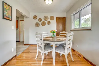 a dining room with a table and chairs at 7 Mi to Downtown Columbus Family Getaway with Yard in Columbus